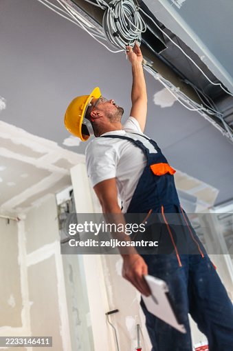 Construction engineer inspecting cheching work progress Construction engineer inspecting cheching work progress