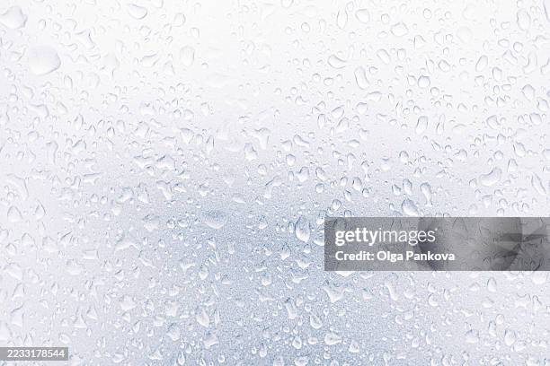 water droplets forming on a smooth surface - condensation stock pictures, royalty-free photos & images