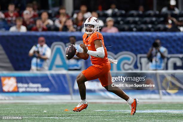 Kyron Drones of the Virginia Tech Hokies looks to pass the ball during the AFLAC Kickoff Game against the South Carolina Gamecocks on August 31, 2025...
