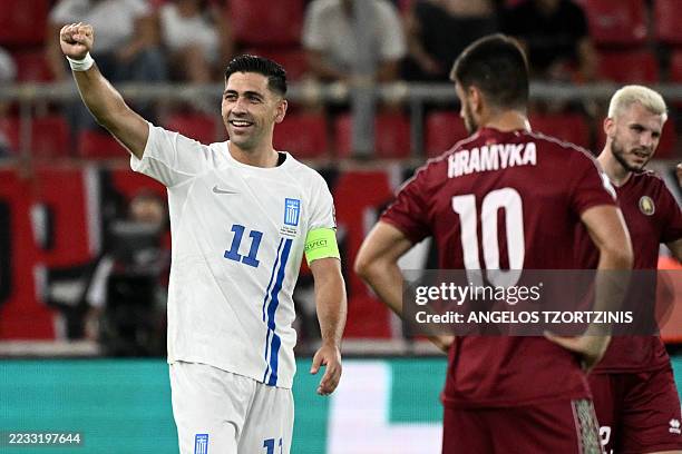 Greece's midfielder Tasos Bakasetas celebrates scoring his team's third goal during the FIFA World Cup 2026 Group C European qualification football...