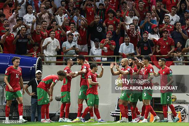 Morocco's players celebrate scoring during the FIFA World Cup 2026 Group E African qualification football match between Morocco and Niger at the...