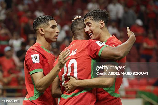 Morocco's forward Ayoub El Kaabi celebrates scoring with his teammates during the FIFA World Cup 2026 Group E African qualification football match...