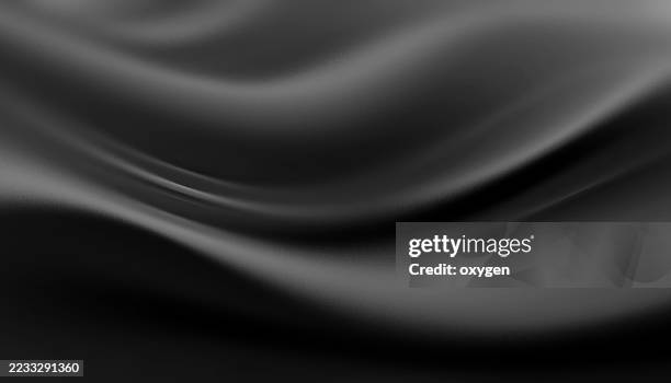 smooth black satin texture with flowing folds background. elegant abstract image resembling black satin fabric with soft, flowing curves and a subtle, silky sheen. - satin stock pictures, royalty-free photos & images