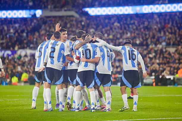 Lionel Messi of Argentina celebrates with his teammates after scoring a goal during the FIFA World Cup Qualifier between Argentina and Venezuela at...