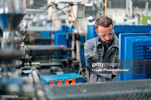 Plastic Injection Engineer 180 Plastic Injection Machine Stock Photos, High-Res Pictures, and ...