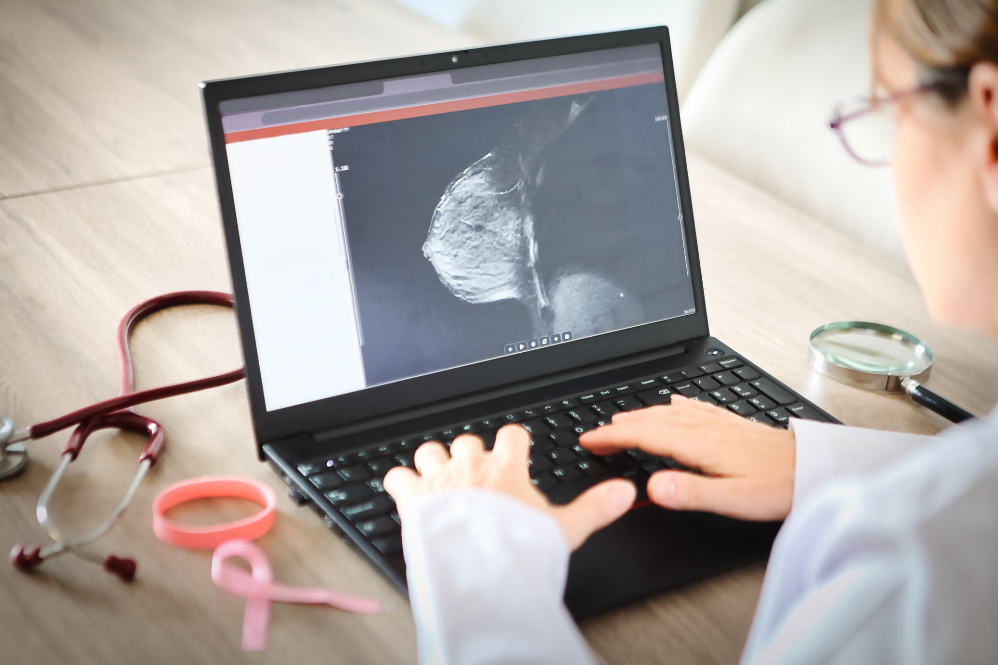 woman getting mammogram