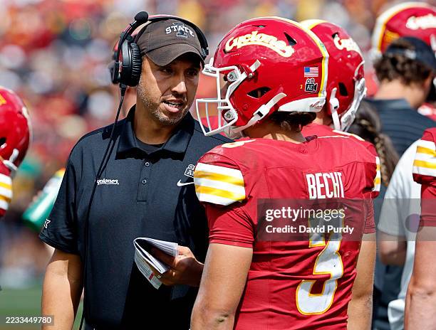 Head coach Matt Campbell of the Iowa State Cyclones cpaches quarterback Rocco Becht of the Iowa State Cyclones during a time out in the second half...