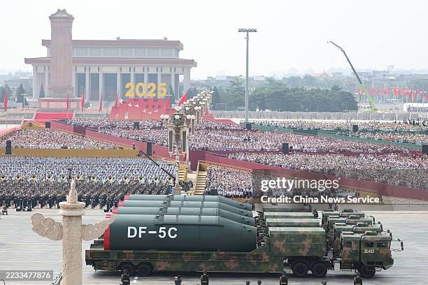 China's liquid-fueled intercontinental strategic nuclear missiles DongFeng-5C, which have a global strike range, pass through Tian'anmen Square...