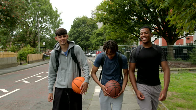 https://media.gettyimages.com/id/2233487681/video/teens-walking-to-basketball-court.jpg?b=1&s=640x640&k=20&c=Q0BUtdVqbzcBUhwsHk-rE3eZqL-rGzrH-0v1W6TJwUg=