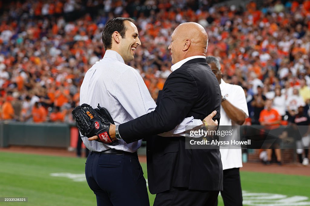 Cal Ripken Ryan Ripken Ryan Ripken greets his dad, Cal Ripken Jr., after throwing the... News ...