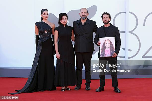 Saja Kilani, Clara Khoury, Amer Hlehel and Motaz Malhees attend the "The Voice Of Hind Rajab" red carpet during the 82nd Venice International Film...