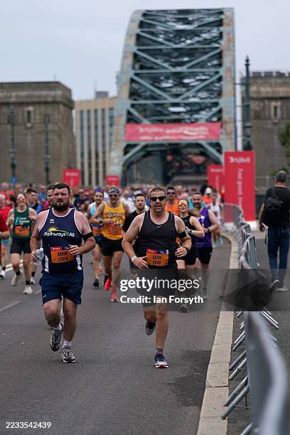 Runners cross the Tyne bridge during the 44th Great North Run on September 7, 2025 in Newcastle upon Tyne, England. The Great North Run is the...