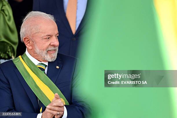 Brazil's President Luiz Inacio Lula da Silva gestures during the military parade within the Independence Day celebrations in Brasilia on September 7,...
