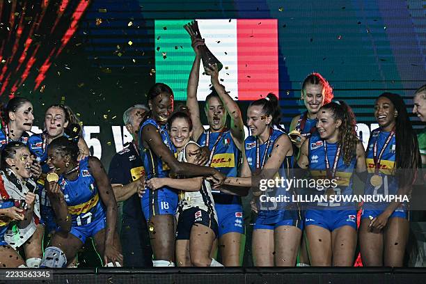 Team Italy celebrate with the trophy and their gold medal after winning the final match against Turkey in the 2025 Women's Volleyball World...