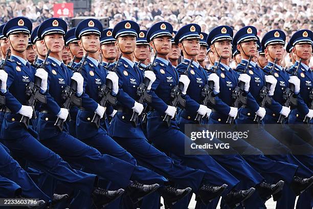 The formation of the Chinese People's Liberation Army Air Force marches through Tian'anmen Square during V-Day military parade to commemorate the...