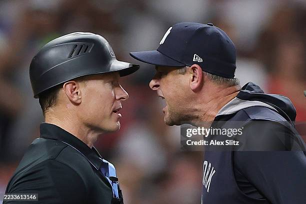 Aaron Boone of the New York Yankees argues with umpire Marty Foster during the eighth inning against the Houston Astros at Daikin Park on September...