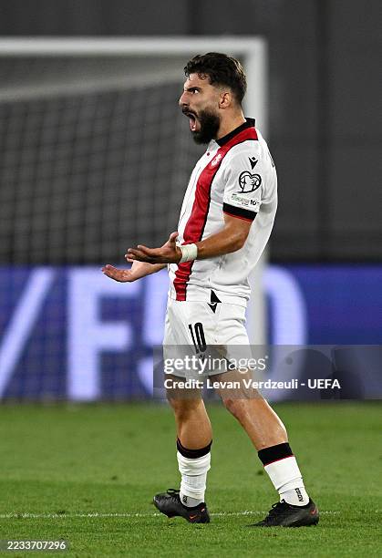 Zuriko Davitashvili of Georgia celebrates scoring his team's first goal during the FIFA World Cup 2026 qualifier match between Georgia and Türkiye at...