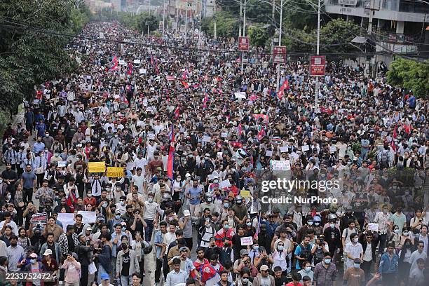 Nepali student protestors clash with police near the Federal Parliament building in Kathmandu, Nepal, on September 8 as they defy the prohibitory...