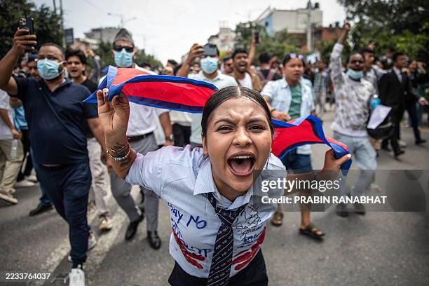 Demonstrator shouts slogans during a protest outside the Parliament in Kathmandu on September 8 condemning social media prohibitions and corruption...