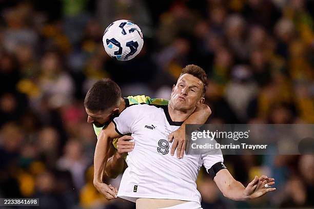 Milos Degenek of Australia competes with Chris Wood of New Zealand during the International Friendly Match between Australia Socceroos and New...