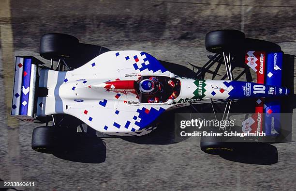 Gianni Morbidelli is seen from above exiting pit lane in his Footwork FA15 the San Marino Grand Prix at Autodromo Enzo e Dino Ferrari, Imola, Italy,...