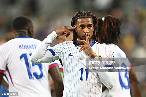 Michael Olise of France celebrates scoring his team's first goal during the FIFA World Cup 2026 qualifier match between Ukraine and France at...
