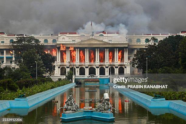Fire rages through the Singha Durbar, the main administrative building for the Nepal government, in Kathmandu on September 9 a day after a police...