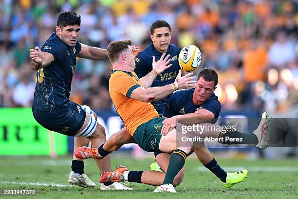 Andrew Kellaway of the Wallabies is tackled during The Rugby Championship match between Australia Wallabies and Argentina Pumas at Queensland Country...