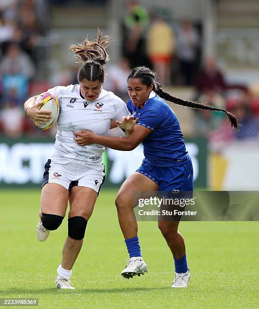 Ilona Maher of USA is tackled by Lutia Col Aumua of Samoa during the Women's Rugby World Cup 2025 Pool A match between USA and Samoa at York...