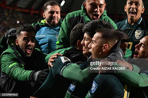 Bolivia's forward Miguel Terceros celebrates with his teammates after scoring his team's first goal during the 2026 FIFA World Cup South American...