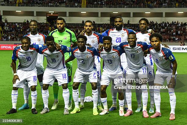 Haiti's players pose for a team photo ahead of the 2026 FIFA World Cup Concacaf qualifier football match between Costa Rica and Haiti at the National...