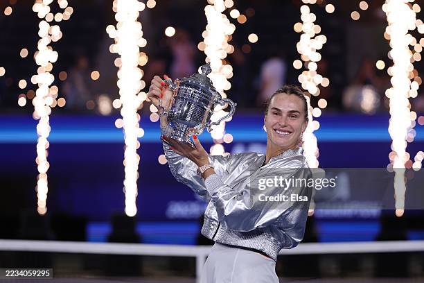 Aryna Sabalenka poses with her trophy after defeating Amanda Anisimova of the United States during their Women's Singles Final match on Day Fourteen...