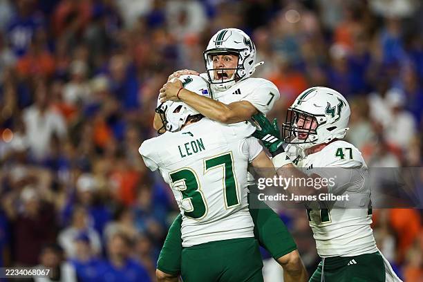 Nico Gramatica of the South Florida Bulls celebrates after making a game winning field goal during the second half of a game against the Florida...
