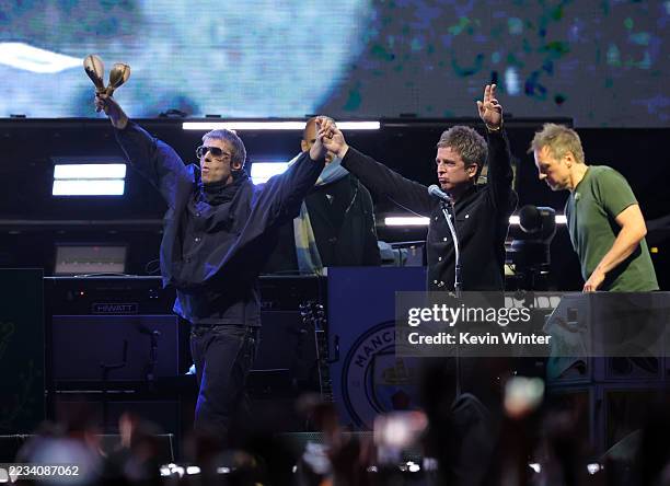 Liam Gallagher and Noel Gallagher of Oasis perform onstage during the Oasis Live '25 World Tour at Rose Bowl Stadium on September 06, 2025 in...