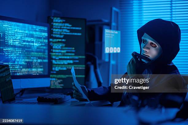 modern hacker using holographic interface for cybercrime. - trade secrets stock pictures, royalty-free photos & images