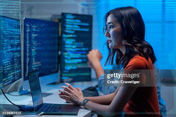 futuristic programming team analyzing network security. - programmazione televisiva foto e immagini stock