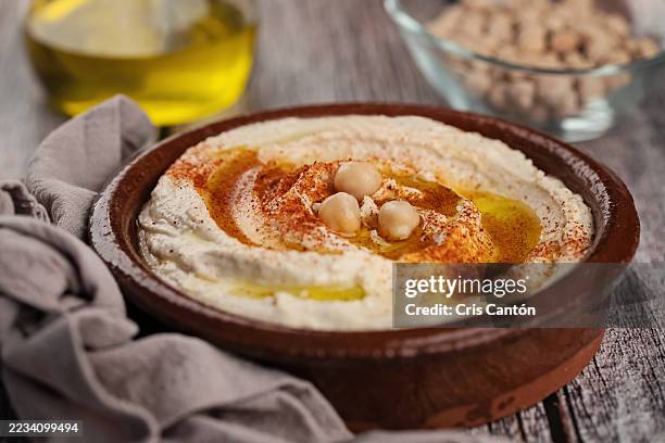 bowl of hummus - tahini stock pictures, royalty-free photos & images