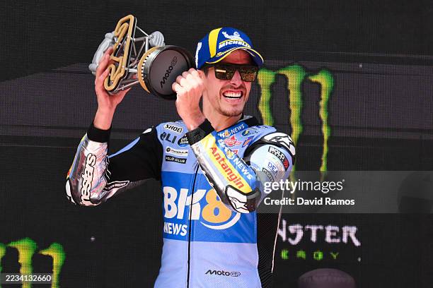 Alex Marquez of Spain and Bk8 Gresini Racing Team celebrates on the podium after winning the Monster Energy MotoGP Grand prix at Circuit de...