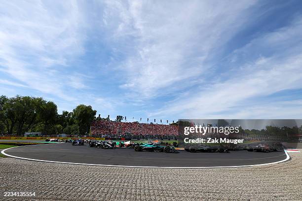 George Russell of Great Britain driving the Mercedes AMG Petronas F1 Team W16 leads Fernando Alonso of Spain driving the Aston Martin F1 Team AMR25...