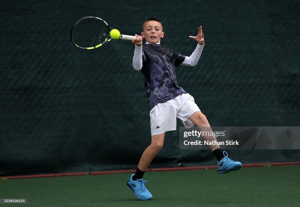 Perry Manchester A competitor plays a forehand during the Fred Perry Tennis Trust ...
