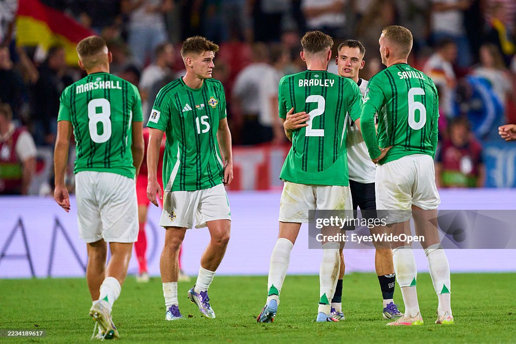 Callum Marshall of North Ireland Justin Devenny of North Ireland