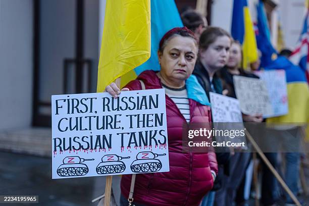 Ukrainian protesters and supporters gather outside the Royal Opera House as they demonstrate against the performance of Russian soprano Anna Netrebko...