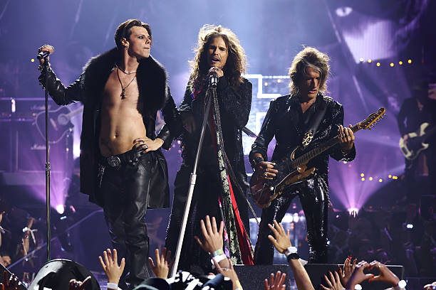 Yungblud, Steven Tyler, and Joe Perry perform during a tribute to Ozzy Osbourne at the 2025 MTV Video Music Awards at UBS Arena on September 07, 2025...