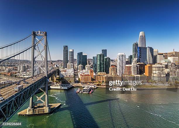 san francisco waterfront skyline aerial with bay bridge - san-francisco-bay-area-aerial stock pictures, royalty-free photos & images
