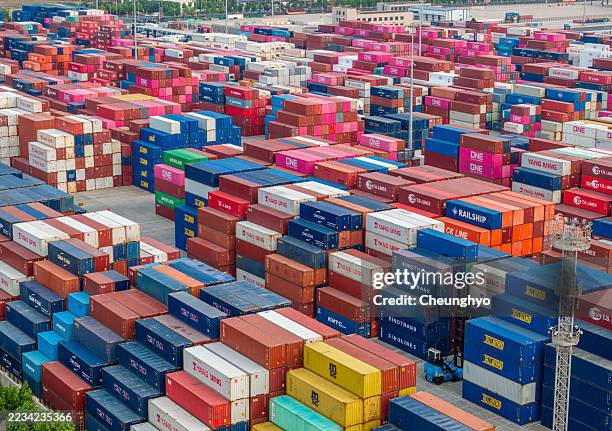 drone aerial view of a container port, shenzhen, china - trade war stock pictures, royalty-free photos & images