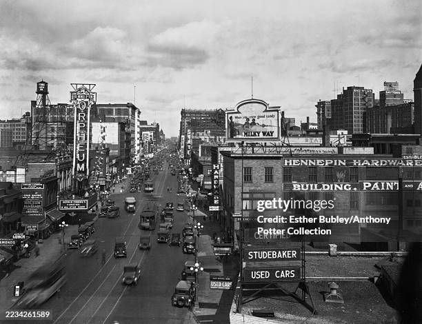 View of Hennepin Avenue looking towards the river from approximately 11th Street, Minneapolis, Minnesota, circa 1927. The Hennepin Orpheum Theatre is...