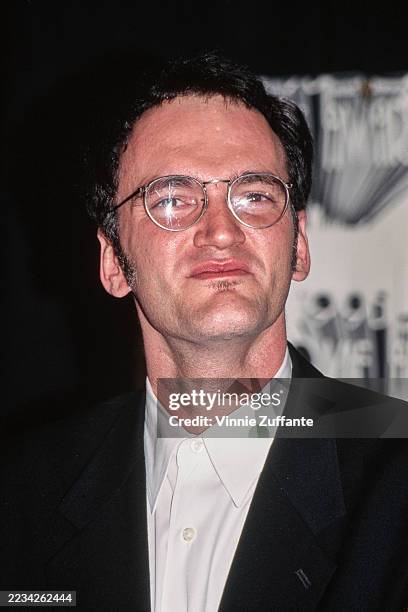 American filmmaker Quentin Tarantino attends the MTV Movie Awards at the Warner Bros Studios in Burbank, California, 10th June 1995. Tarantino won...