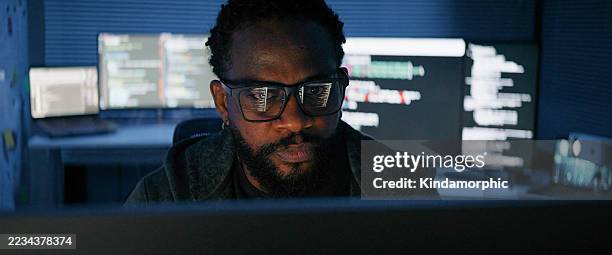 black african american male, software engineer developer use computer at home office, work on program coding at night. programming language development technology, freelance work from home concept - multiple screens stock pictures, royalty-free photos & images