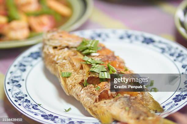 fried fish - fried stock pictures, royalty-free photos & images