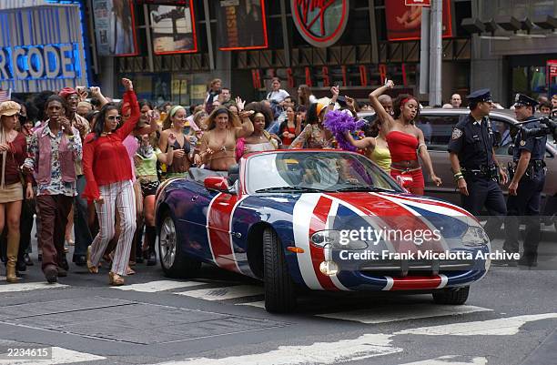 Beyonce Knowles and Mike Myers arrive in the Austin Powers spy car for MTV TRL to promote the film "Austin Powers in Goldmember" at the MTV Times...
